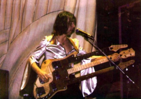 Roger Newell with 3 neck bass